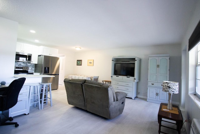 living room featuring light hardwood / wood-style flooring