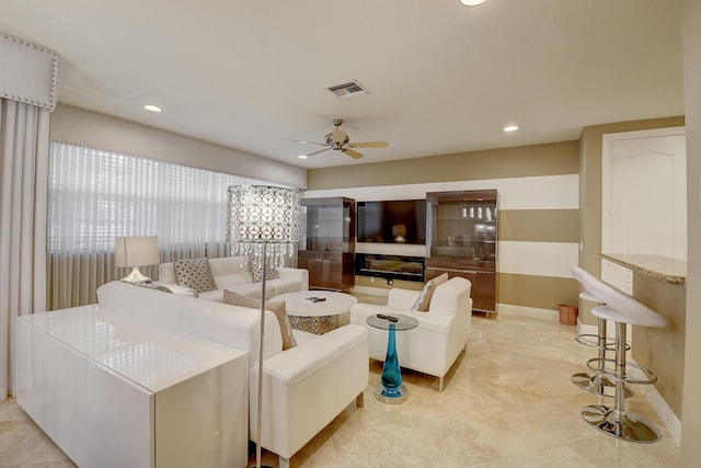 living room featuring ceiling fan