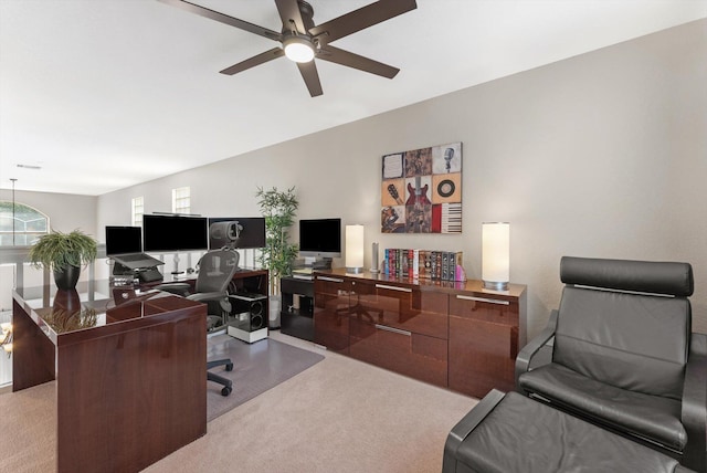 office featuring light colored carpet and lofted ceiling