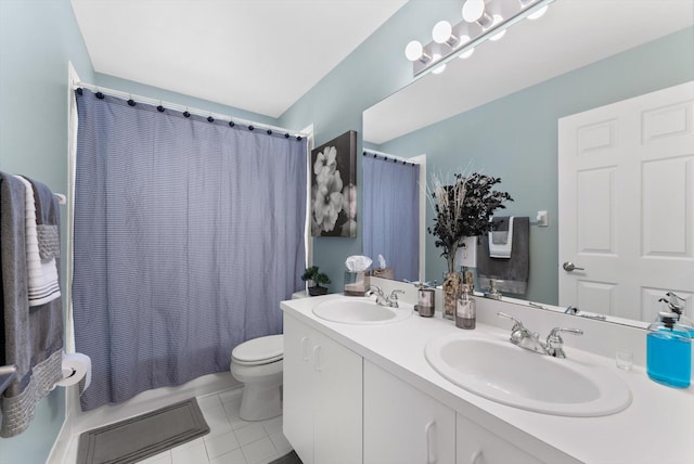 full bathroom featuring tile patterned floors, vanity, shower / bath combination with curtain, and toilet