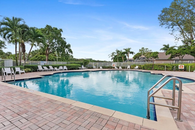 view of pool featuring a patio area