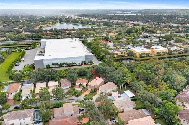 drone / aerial view with a water view