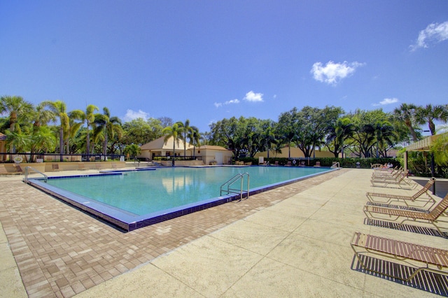 view of pool featuring a patio