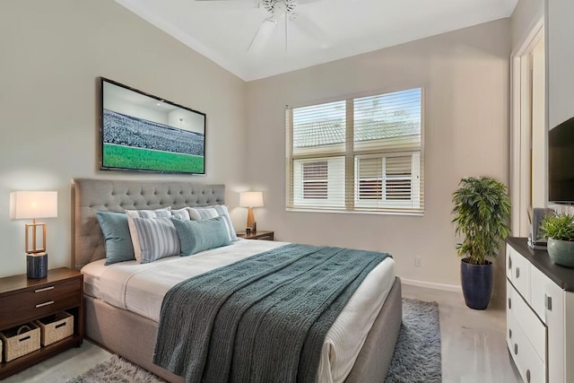 bedroom featuring ceiling fan and light carpet