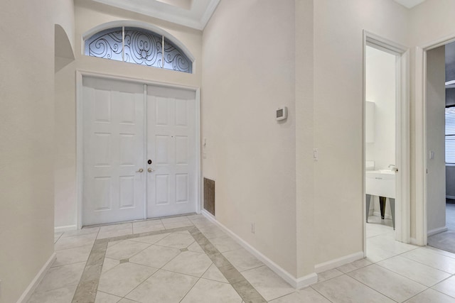 view of tiled foyer entrance