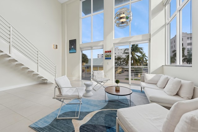 tiled living room with a high ceiling