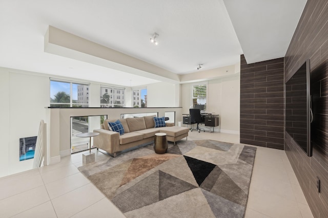 living room with light tile patterned floors