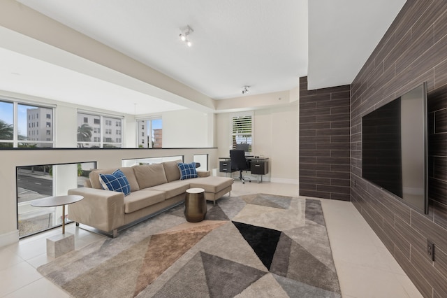 living room featuring light tile patterned flooring