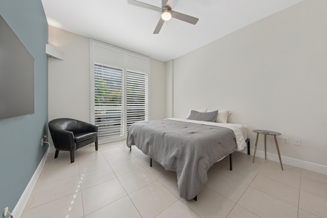 bedroom with ceiling fan and light tile patterned floors