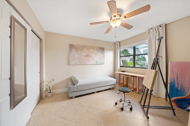 bedroom with light tile patterned floors and ceiling fan