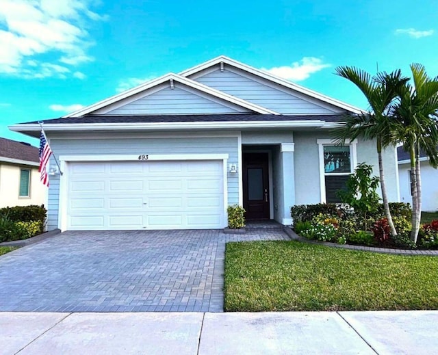 view of front of property with a garage