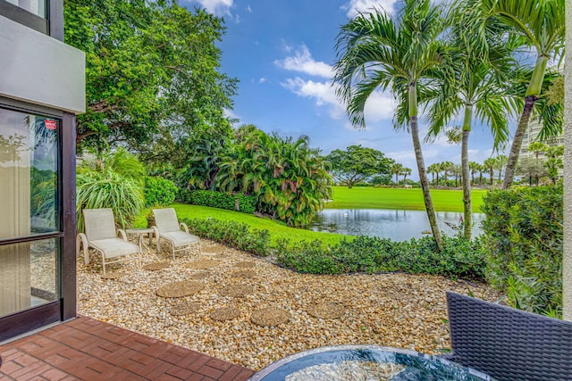 view of patio / terrace with a water view