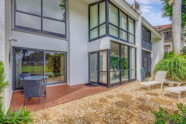 rear view of house with a patio