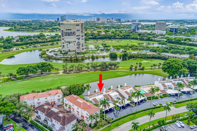 birds eye view of property featuring a water view