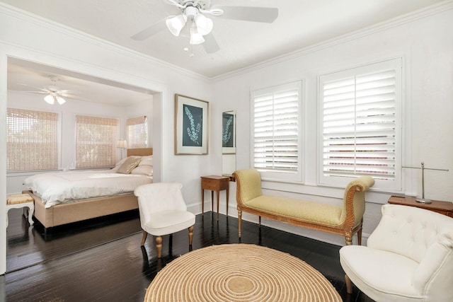 bedroom with ceiling fan, ornamental molding, and hardwood / wood-style flooring