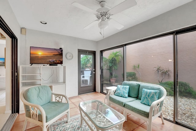 sunroom / solarium with ceiling fan