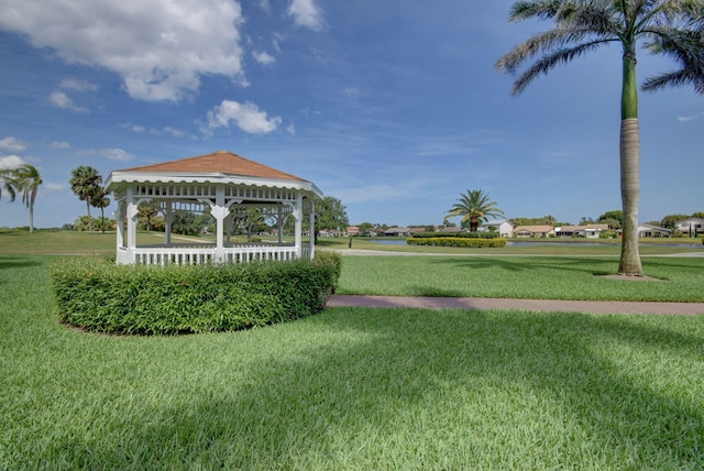 view of community featuring a gazebo and a lawn