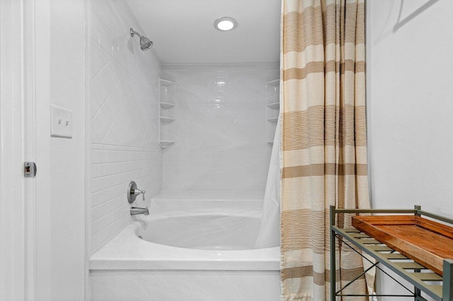 bathroom with shower / bath combo