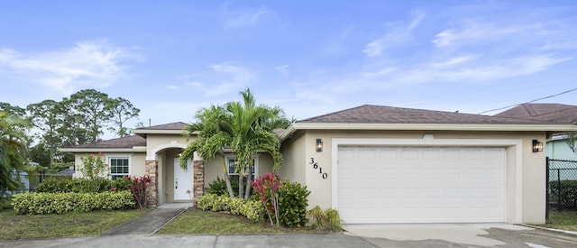 single story home featuring a garage