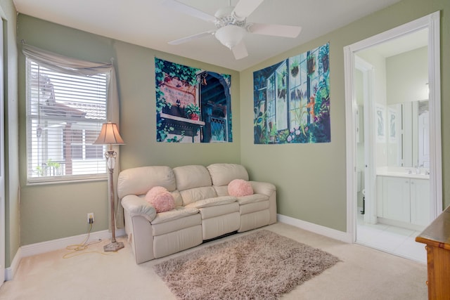 living room with carpet flooring and ceiling fan