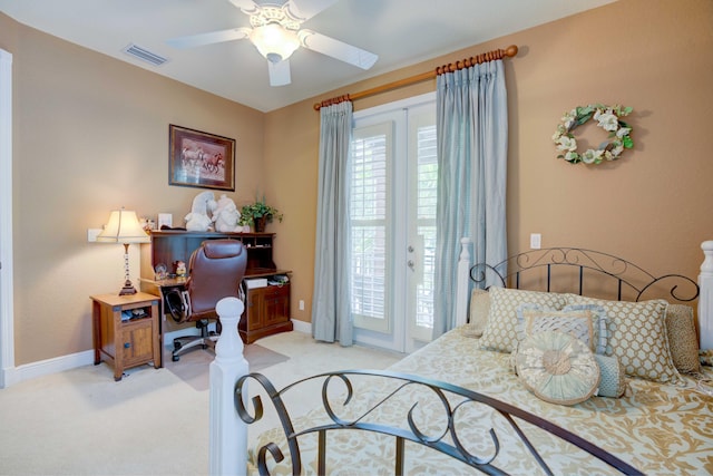 bedroom with access to outside, ceiling fan, and light colored carpet