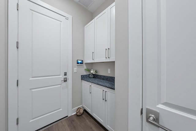 interior space featuring dark wood-type flooring