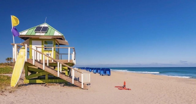 exterior space featuring a beach view