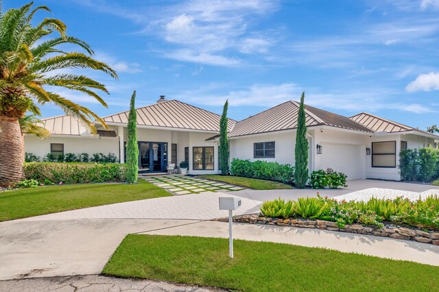 view of front of home with a front lawn