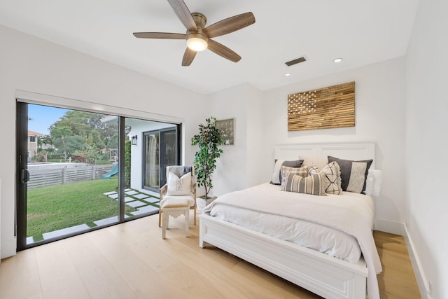 bedroom with access to outside, ceiling fan, and light wood-type flooring