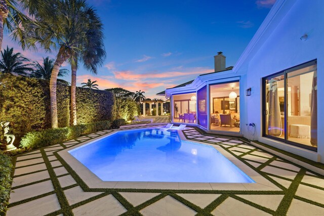 view of patio / terrace with a pergola and grilling area