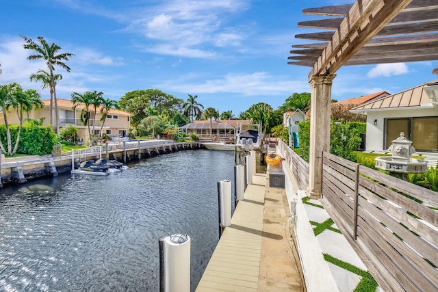 view of dock with a water view and a pergola