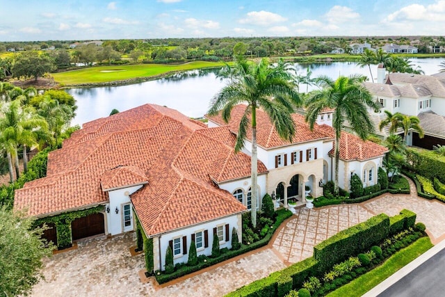 birds eye view of property featuring a water view