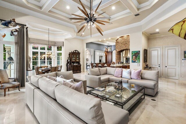 living room with a towering ceiling, coffered ceiling, crown molding, beamed ceiling, and pool table