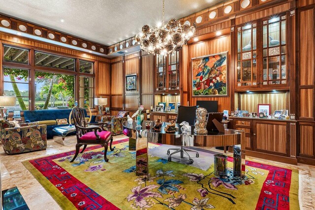 living room with coffered ceiling, a towering ceiling, crown molding, and a chandelier