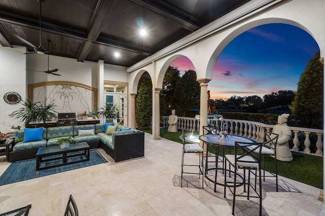 view of patio featuring grilling area, outdoor lounge area, and a ceiling fan