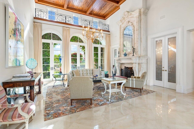 interior space with beamed ceiling, french doors, wooden ceiling, and coffered ceiling