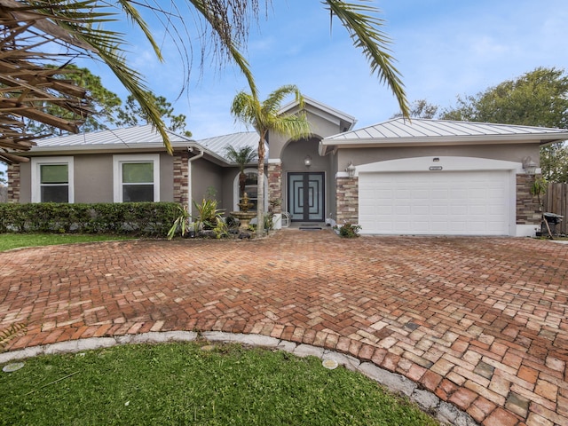 single story home with a garage