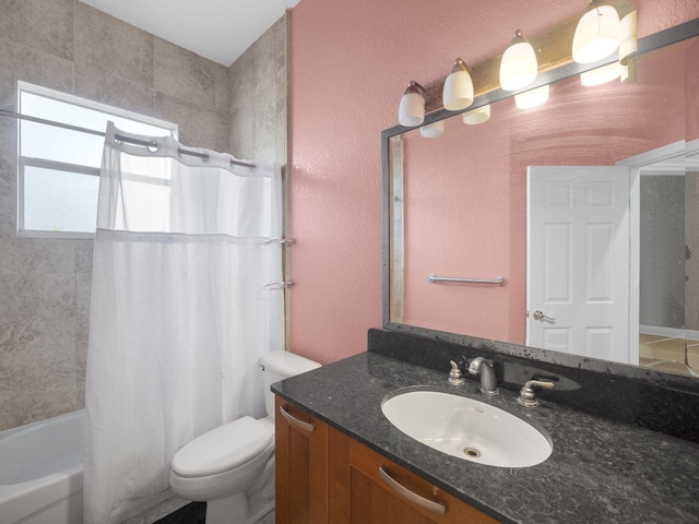 full bathroom featuring vanity, toilet, and shower / bath combo with shower curtain