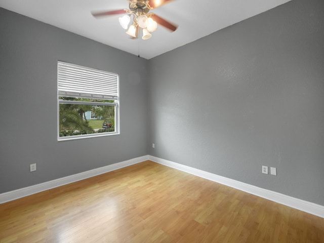 unfurnished room with light hardwood / wood-style floors and ceiling fan