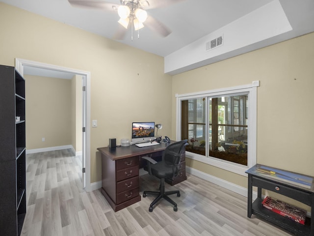 home office featuring ceiling fan and light wood-type flooring