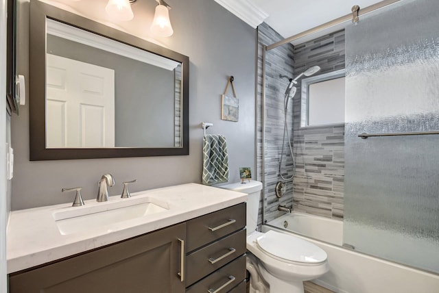 full bathroom with shower / bath combination with glass door, vanity, toilet, and crown molding