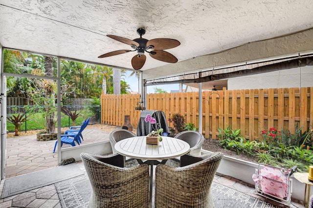 view of patio with ceiling fan