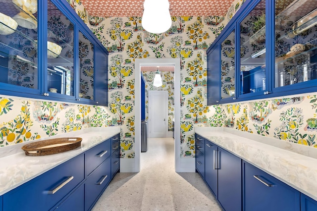 interior space featuring blue cabinets