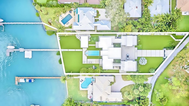 birds eye view of property featuring a water view