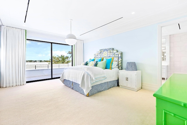 carpeted bedroom featuring connected bathroom, access to outside, and ceiling fan