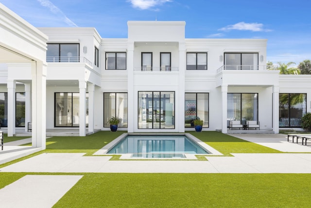 back of house featuring a patio area