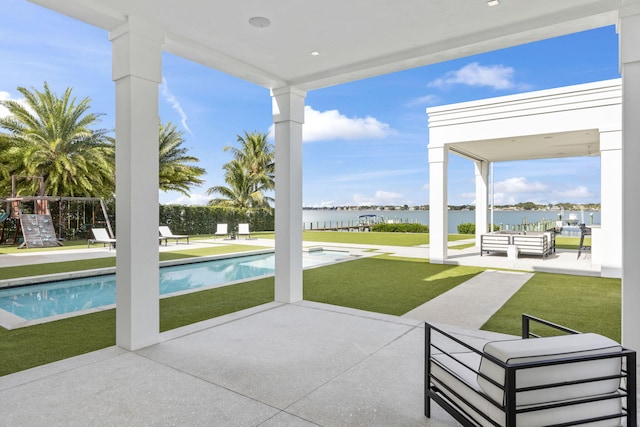 exterior space featuring a water view and an outdoor hangout area