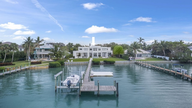 dock area featuring a water view and a lawn