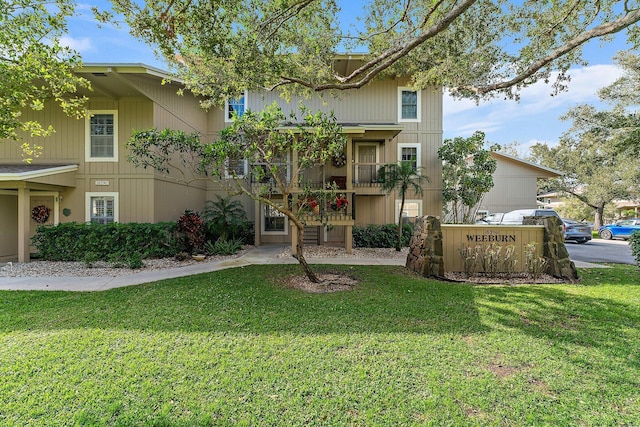 view of front of home with a front yard