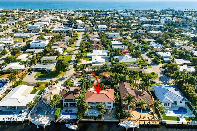 birds eye view of property featuring a water view